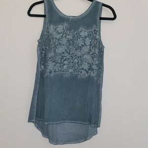 This cute teal embroidered blouse from Francesca’s is perfect for summer!